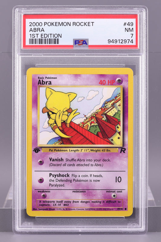 Abra 2000  Team Rocket  #49    PSA 7   1st Edition